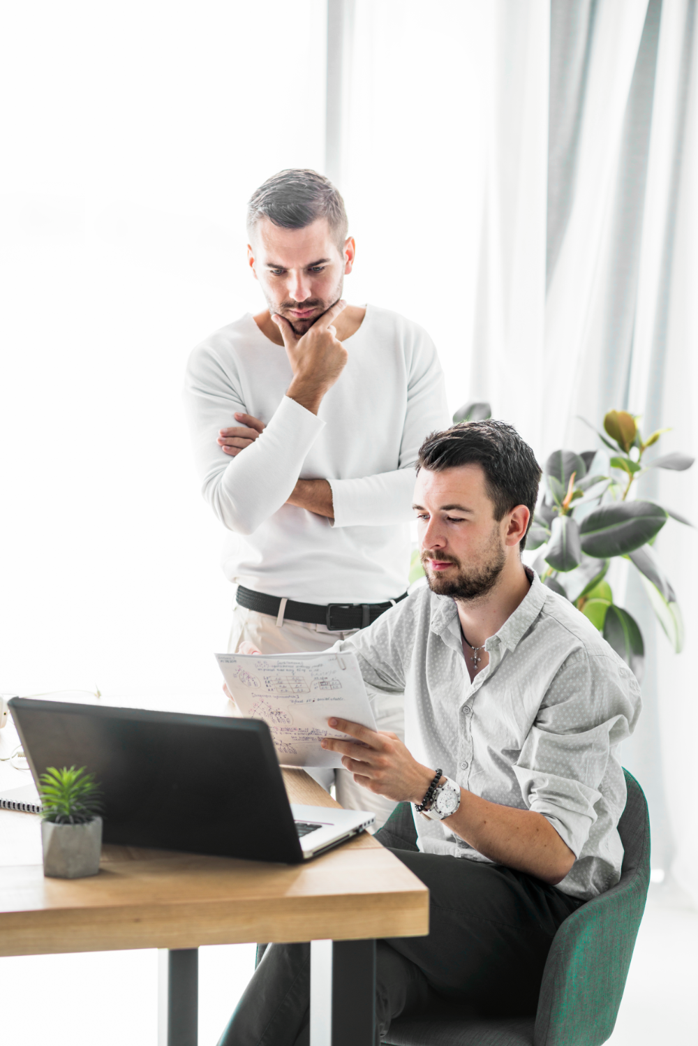 two-male-businessmen-working-office