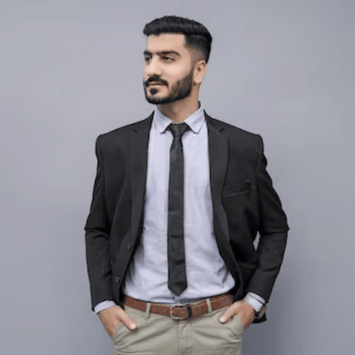 businessman-standing-with-hands-pocket-looking-left-black-suit-indian-pakistani-model_561639-130