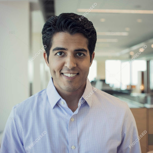focused_173580802-stock-photo-portrait-indian-businessman-standing-office
